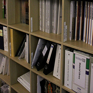 Photo of a self full of binders